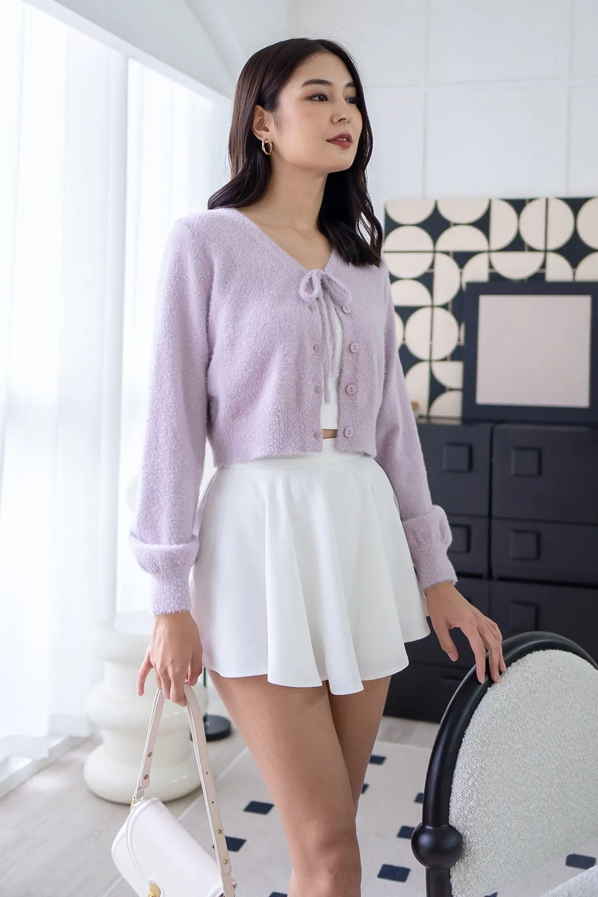 ELIZ BOW FURRY CARDIGAN IN LILAC