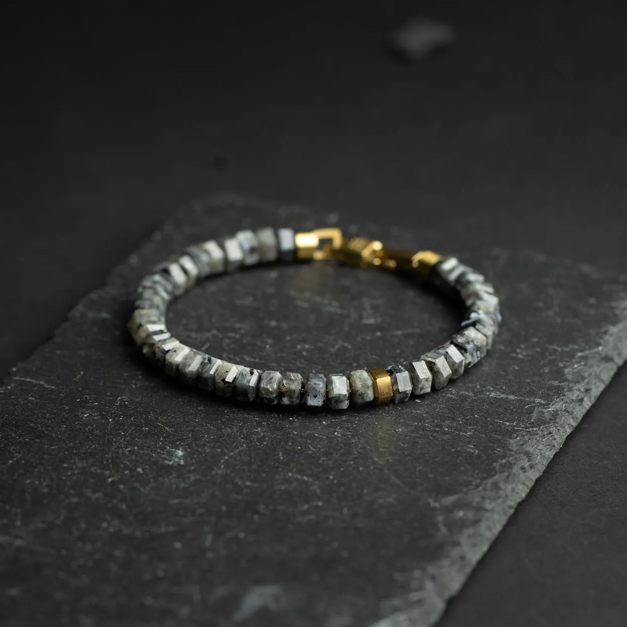 Exclusive bracelet with hand-cut Larvikite stone and 18k gold plating