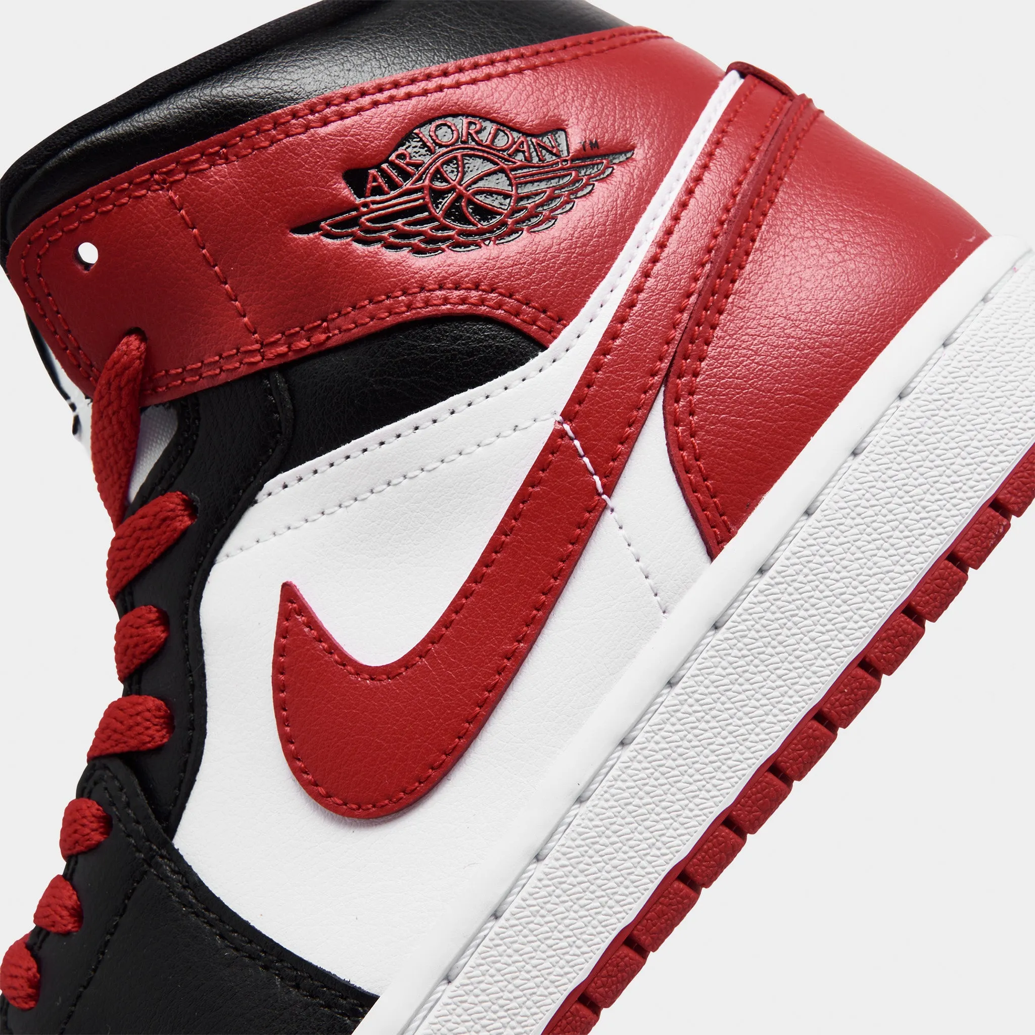 Jordan 1 Mid Black / Gym Red